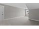 Neutral bedroom features new carpet, light gray walls and a bright window at 75 Woodbark Cv # 10, Willow Springs, NC 27592