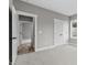 Spacious bedroom featuring a walk in closet and doorway at 75 Woodbark Cv # 10, Willow Springs, NC 27592