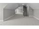 Spacious carpeted bonus room with angled ceilings and ample natural light at 75 Woodbark Cv # 10, Willow Springs, NC 27592