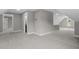 Bright and spacious carpeted bonus room with neutral walls and ample natural light at 75 Woodbark Cv # 10, Willow Springs, NC 27592