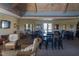 Spacious community room with tables and chairs at 95 Colonial Trail Ct, Pittsboro, NC 27312
