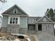 Craftsman style home with stone and gray siding at 95 Colonial Trail Ct, Pittsboro, NC 27312