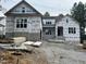 New home construction with brick and siding at 95 Colonial Trail Ct, Pittsboro, NC 27312
