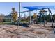 Swings near playground and clubhouse at 95 Colonial Trail Ct, Pittsboro, NC 27312
