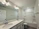 The bathroom features double sinks, a quartz countertop, and a shower-tub combination, creating a relaxing retreat at 492 Traditions Grande Blvd # 26, Wake Forest, NC 27587
