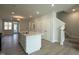 Open kitchen with a large island, stainless steel appliances, and ample cabinet space, perfect for cooking at 492 Traditions Grande Blvd # 26, Wake Forest, NC 27587
