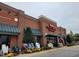 Retail store front for Town and Country Hardware in a small brick commercial building at 492 Traditions Grande Blvd # 26, Wake Forest, NC 27587