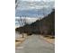 Picturesque walking path with trees along the side, offering a serene environment at 492 Traditions Grande Blvd # 26, Wake Forest, NC 27587
