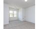 Cozy bedroom with a double window, neutral carpet, and a small closet door at 804 Ambercrest Place, Durham, NC 27705