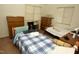 Bedroom featuring two beds, dressers and natural lighting at 2913 Wadsworth Ave, Durham, NC 27707