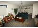 Cozy living room with comfortable seating, a warm ambiance, and ample natural light, perfect for relaxation at 2913 Wadsworth Ave, Durham, NC 27707