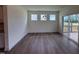 Dining room area with natural lighting and access to outdoor deck at 103 Sage Ln # 009, Four Oaks, NC 27524