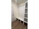 Inviting mudroom featuring a bench, coat hooks and storage at 103 Sage Ln # 009, Four Oaks, NC 27524