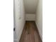 Unfinished storage space featuring wood-look floors at 103 Sage Ln # 009, Four Oaks, NC 27524