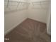 Spacious walk-in closet with metal shelving for ample storage at 103 Sage Ln # 009, Four Oaks, NC 27524
