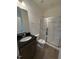 Bathroom featuring a single vanity and stand-up shower with glass door at 123 Sage Ln # 010, Four Oaks, NC 27524