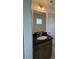 Bathroom features a modern vanity with a granite countertop and tiled floor at 123 Sage Ln # 010, Four Oaks, NC 27524