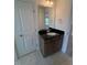 Bathroom features a modern vanity with a granite countertop and tiled floor at 123 Sage Ln # 010, Four Oaks, NC 27524