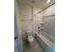 Bright bathroom with a white toilet and a bathtub-shower combination at 123 Sage Ln # 010, Four Oaks, NC 27524