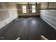 A garage with concrete floors and window to the outside at 123 Sage Ln # 010, Four Oaks, NC 27524