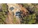 Expansive aerial view of property showcasing large lot, modern home, and circular driveway at 8601 Bishop Pine Ln, Wake Forest, NC 27587