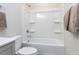 Clean bathroom with a white tub/shower combination, perfect for relaxation and convenience at 6059 Scalybark Road, Durham, NC 27712