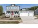 Charming two-story home with a welcoming front porch and attached two-car garage at 6060 Scalybark Rd, Durham, NC 27712