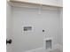 Laundry room with hook, water and electrical outlets at 6060 Scalybark Rd, Durham, NC 27712