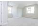 Well-lit bedroom with vaulted ceiling and carpet at 6063 Scalybark Road, Durham, NC 27712