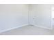 Bright bedroom featuring neutral walls and carpet at 6063 Scalybark Road, Durham, NC 27712