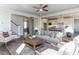 Open living room with hardwood floors and views into the kitchen at 6063 Scalybark Road, Durham, NC 27712