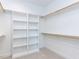 Bright walk-in closet with ample shelving and hanging space at 6063 Scalybark Road, Durham, NC 27712