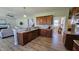 A spacious kitchen with wood cabinets, granite countertops, and stainless appliances at 234 Crystal Springs Way, Benson, NC 27504