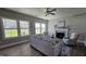 The bright living room features a fireplace and views of the outdoors at 234 Crystal Springs Way, Benson, NC 27504