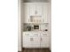Elegant built-in cabinetry featuring white shaker-style doors, gold hardware, and a countertop area at 30 Imperial Oaks Ct, Youngsville, NC 27596