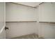 Walk-in closet with shelving and ample space for storage and organization at 30 Imperial Oaks Ct, Youngsville, NC 27596