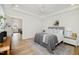 Spacious main bedroom with a neutral color palette and hardwood floors at 30 Imperial Oaks Ct, Youngsville, NC 27596
