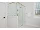 Modern bathroom featuring a frameless glass shower with a marble surround at 30 Imperial Oaks Ct, Youngsville, NC 27596
