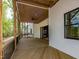 View of the back deck area with wooden ceiling and railing, and a ceiling fan at 122 W Beech Slope Ct, Chapel Hill, NC 27517