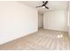Bright, carpeted bedroom with a ceiling fan and a view out the window at 122 W Beech Slope Ct, Chapel Hill, NC 27517