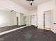 Exercise room with rubber floor and a large mirror on the wall at 122 W Beech Slope Ct, Chapel Hill, NC 27517