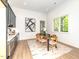 Kitchen with wood table, stainless appliances, and natural light at 122 W Beech Slope Ct, Chapel Hill, NC 27517