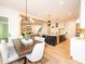 Open concept design with a view from dining area into kitchen and living space at 122 W Beech Slope Ct, Chapel Hill, NC 27517