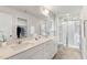 Modern bathroom with double vanity and shower at 141 Beacon Hill Rd # 13, Lillington, NC 27546