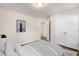 Bedroom with a queen bed and walk-in closet at 141 Beacon Hill Rd # 13, Lillington, NC 27546