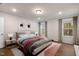 Bright and airy bedroom with hardwood floors and ample natural light at 141 Beacon Hill Rd # 13, Lillington, NC 27546