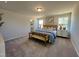 Spacious bedroom with plush carpeting and ample natural light at 141 Beacon Hill Rd # 13, Lillington, NC 27546