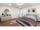 Bright bedroom with a queen bed and wood floors at 141 Beacon Hill Rd # 13, Lillington, NC 27546