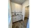 Butlers pantry with granite countertop and ample storage at 141 Beacon Hill Rd # 13, Lillington, NC 27546