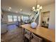 Dining area with wood table and modern chandelier at 141 Beacon Hill Rd # 13, Lillington, NC 27546
